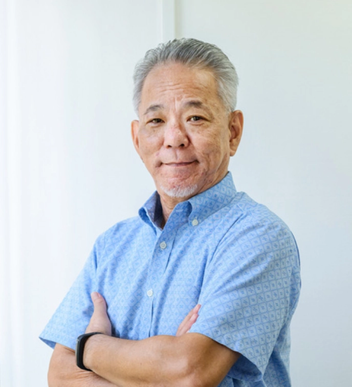常務取締役 建築・企画部 比嘉 義明